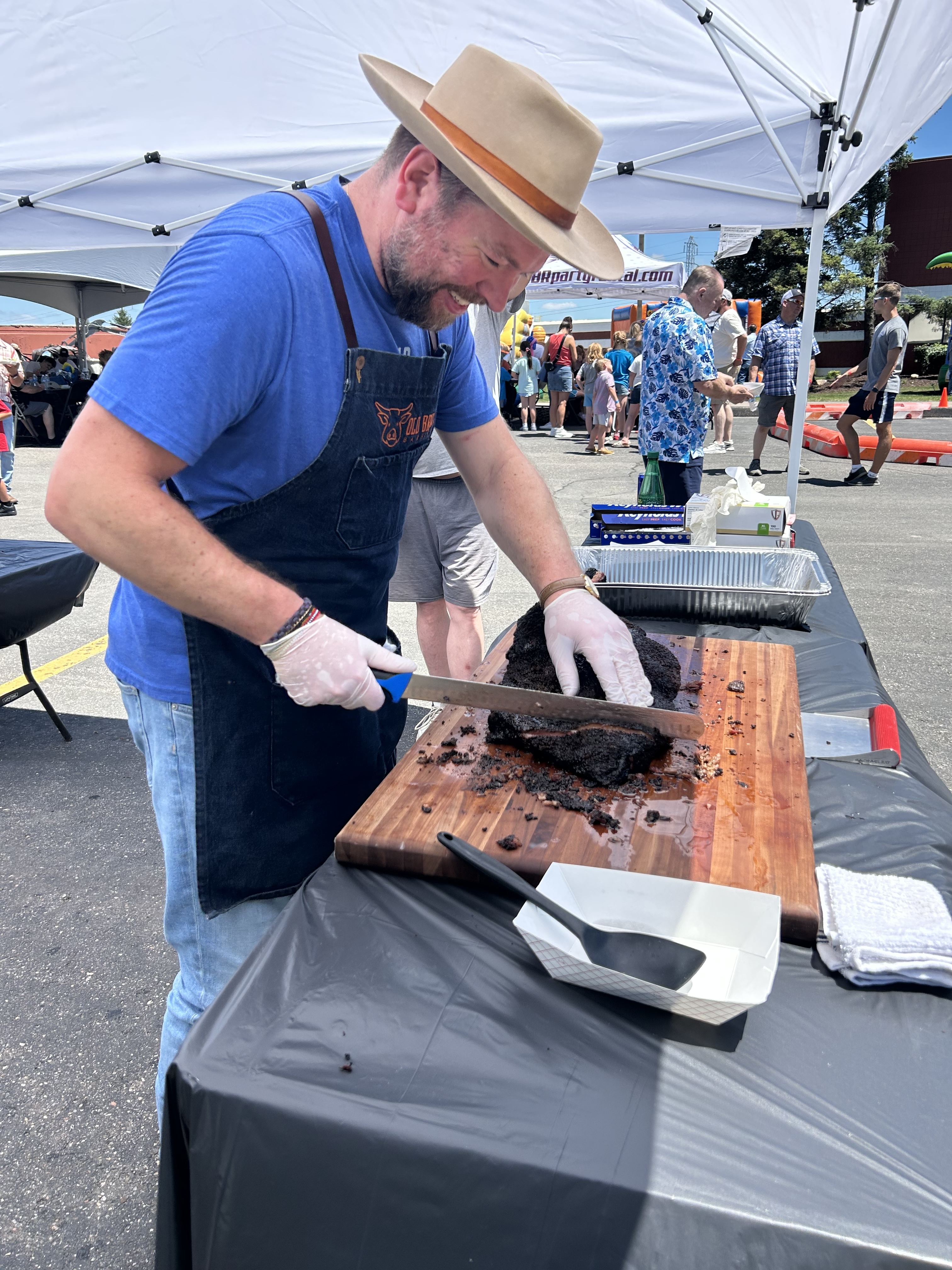 Slicing into a smoked brisket